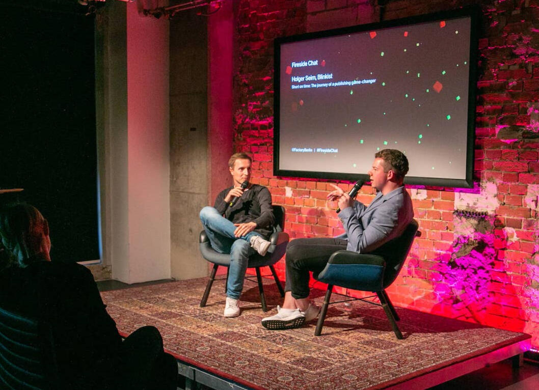 Fabian Tausch hosting a fireside chat with Holger Seim, Co-Founder of Blinkist at Factory Berlin